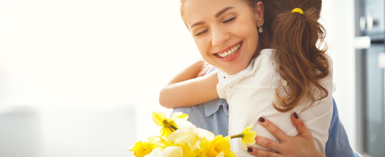 child hugging mother