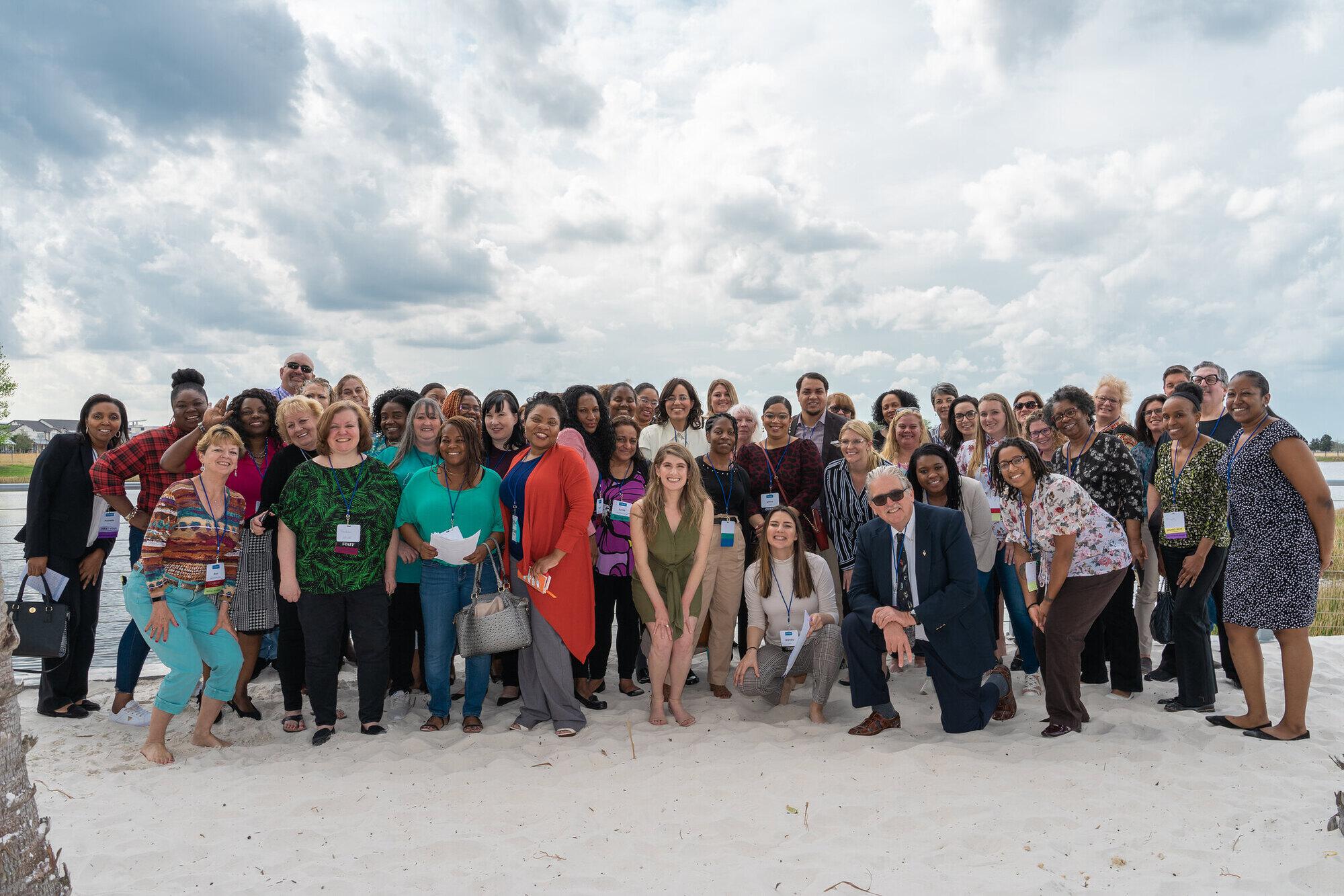 large group of women posing for a picture